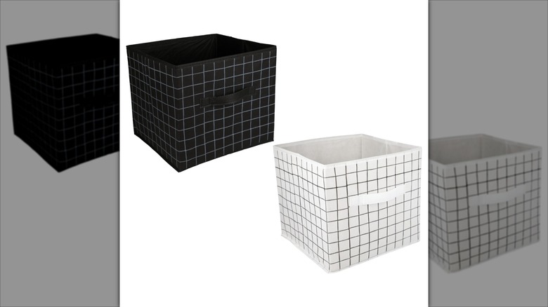 Two collapsible storage bins one in black, the other in white