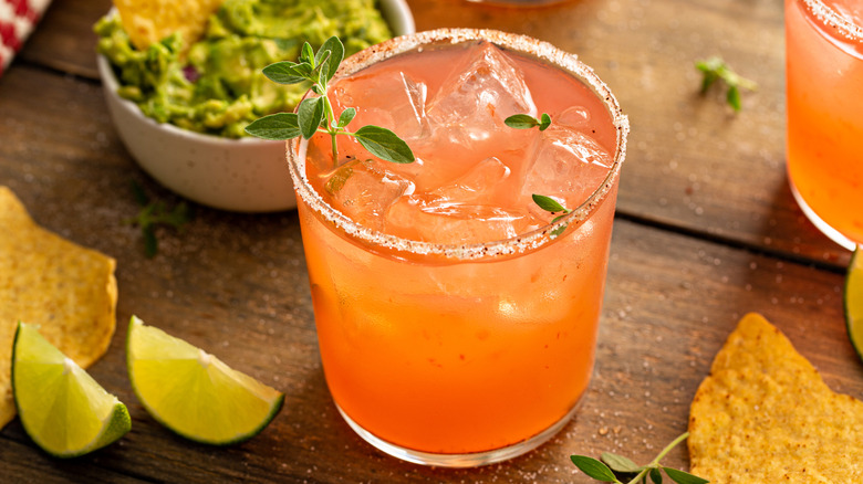 A Paloma cocktail with a salt rim