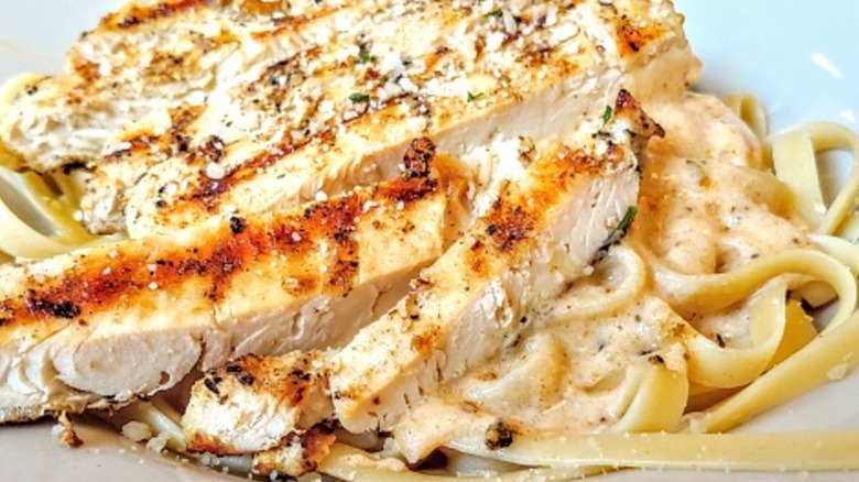 Chicken Alfredo on a white plate