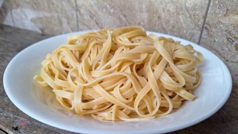 Pasta noodles raw on a dish