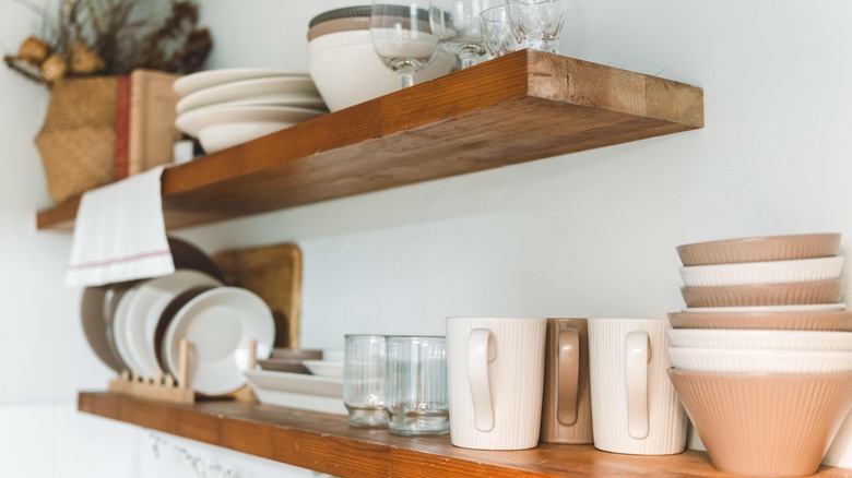 Wooden floating shelves in a kitchen