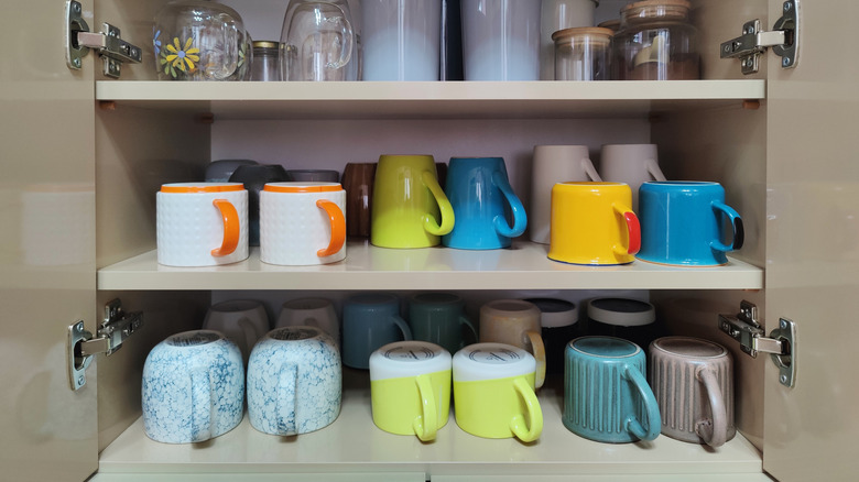 Mug cabinet with glasses and cups