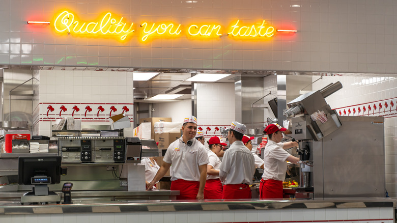 In-N-Out kitchen with neon sign
