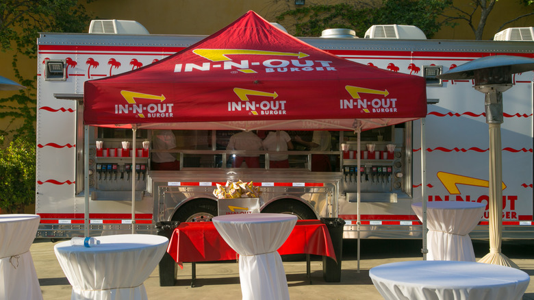 In-N-Out catering truck with tables set up