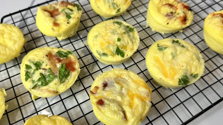 Egg bites cooling on a baking rack