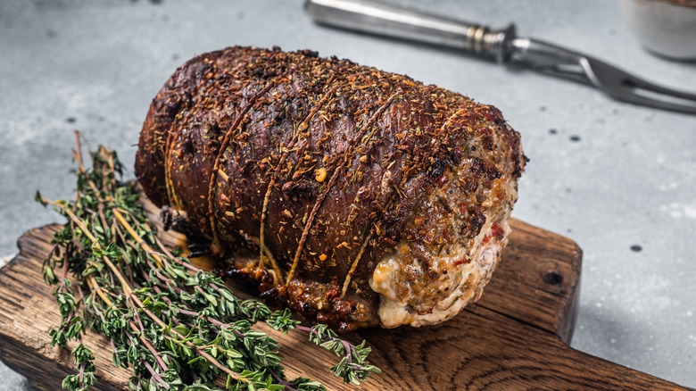 Roast pork on cutting board