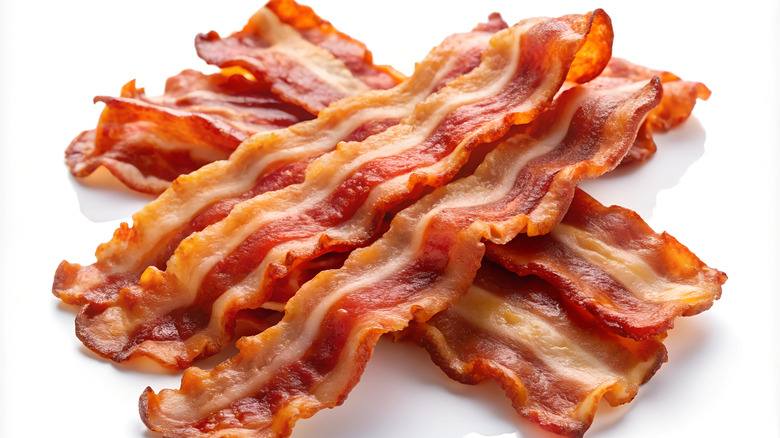 Rashers of bacon in on overlapping pile