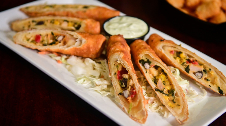 A plate of Southwest egg rolls on a plate