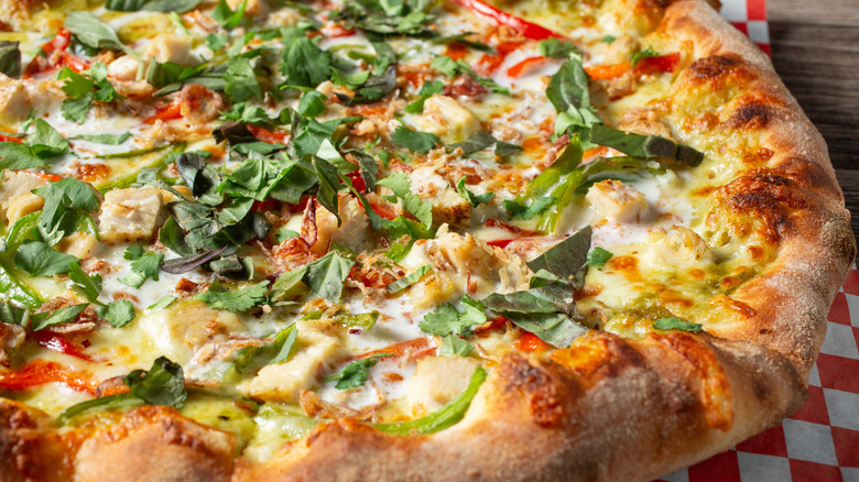 Thai curry pizza with herbs