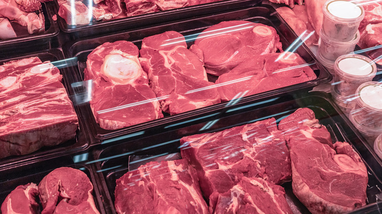 Cuts of meat displayed in a grocery store