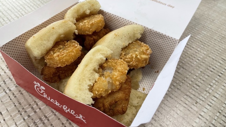 A box of Chick-N-Minis with hash browns