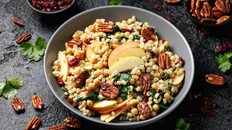 A warm grain salad with kale and nuts