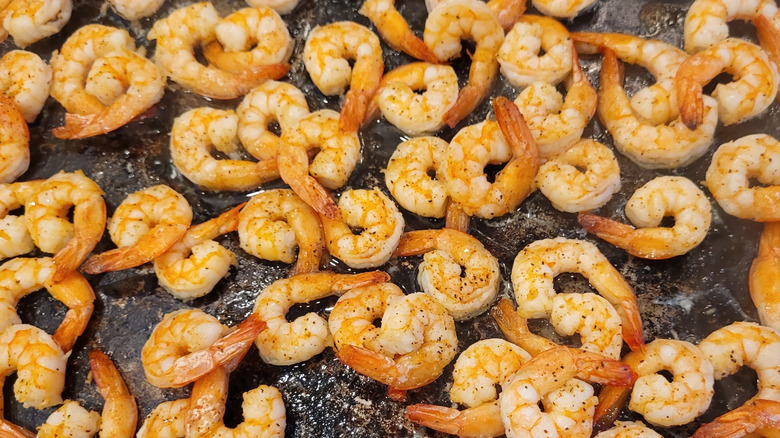 Oven-roasted shrimp on a baking tray