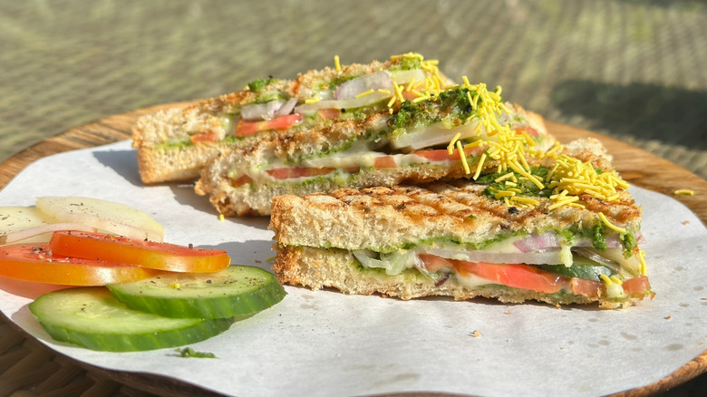 A Bombay sandwich on a wooden table