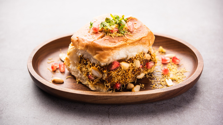A kutchi dabeli sandwich on a plate