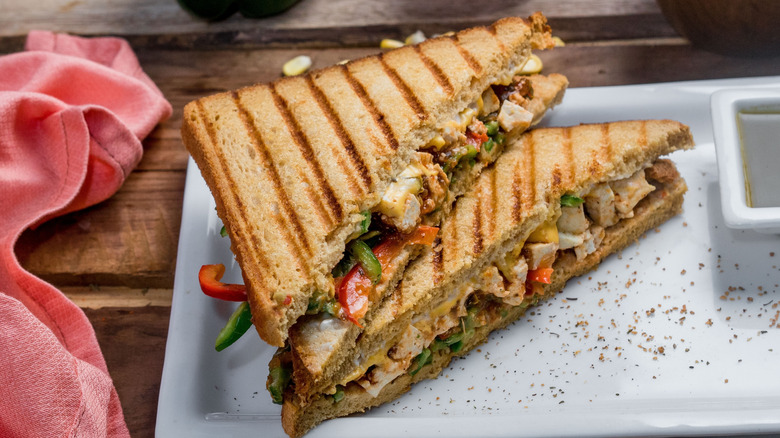 A paneer tikka sandwich on a plate