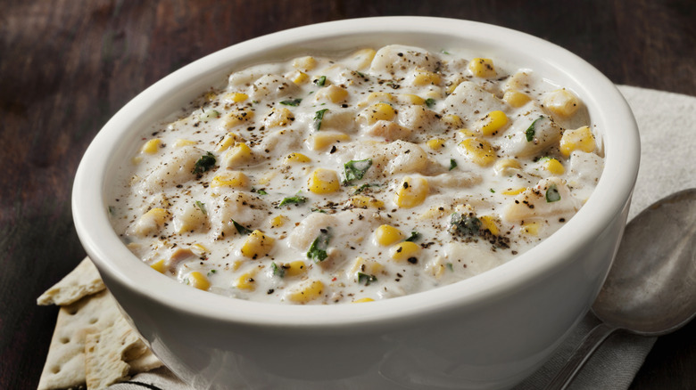 A rustic bowl of creamy well seasoned white chowder