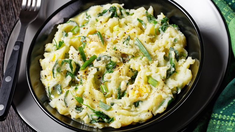 A bowl of colcannon on a table