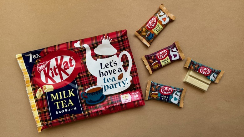 Opened bag of Milk Tea Kit Kats surrounded by individually wrapped pieces