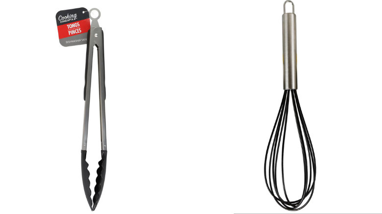 Tongs and a wire whisk against a white backtround