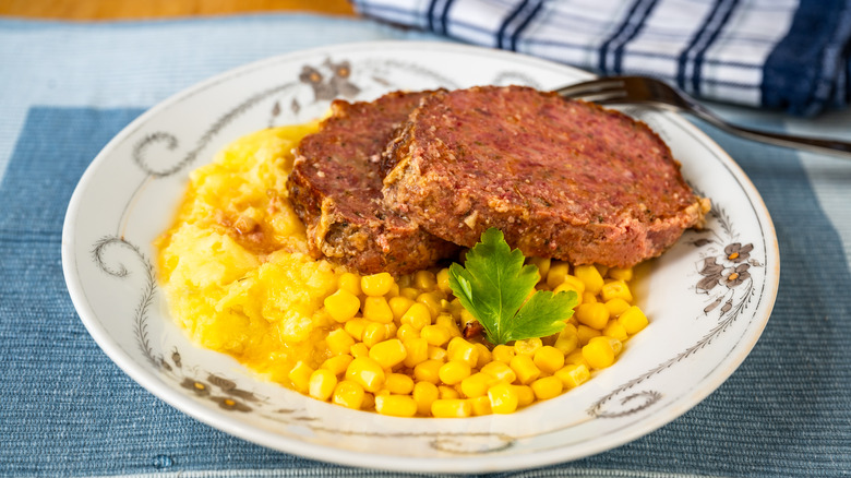 Plate with meatloaf, mashed potatoes, and corn