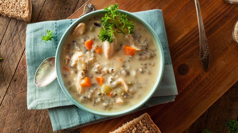 Bowl of wild rice soup on a table