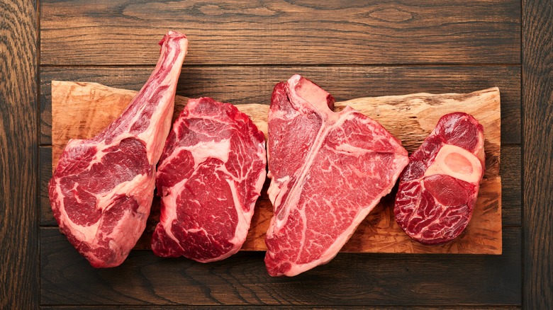 Raw cuts of steak