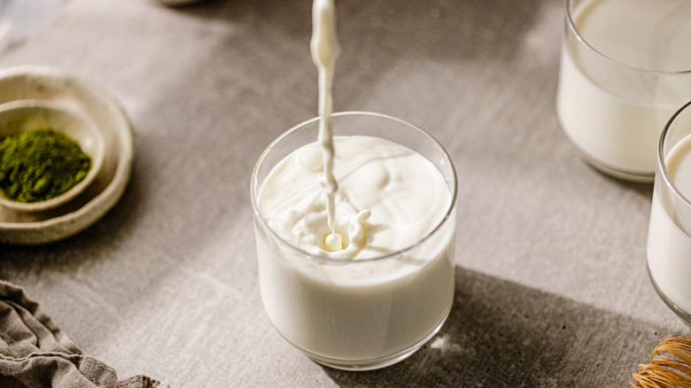 A glass of milk. 