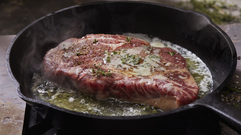 Searing ribeye in a pan