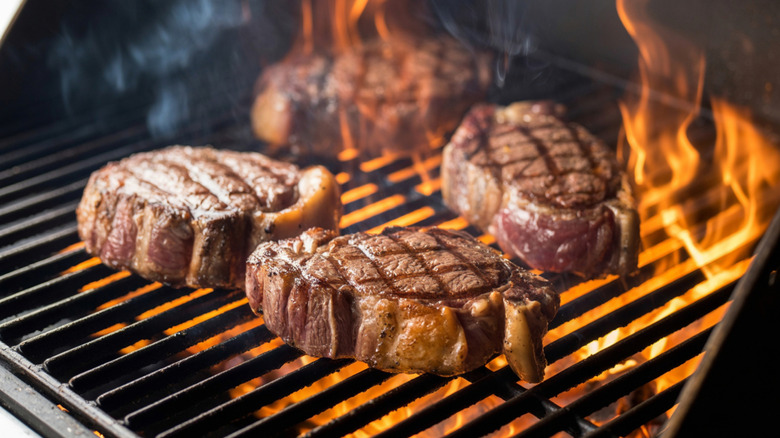 Ribeye steaks on the grill