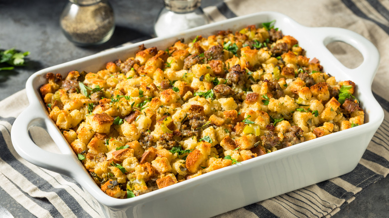 Cornbread and sage stuffing in square white casserole dish