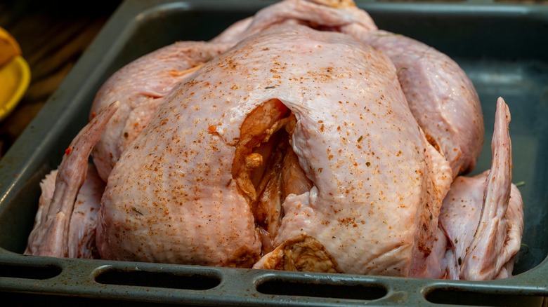 Dry seasoned turkey in a pan
