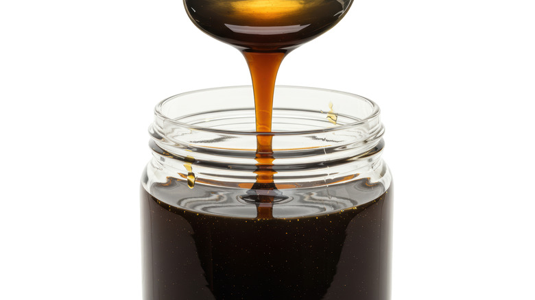 Molasses on white background