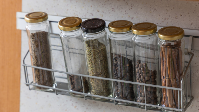 Jars of spices on a rack