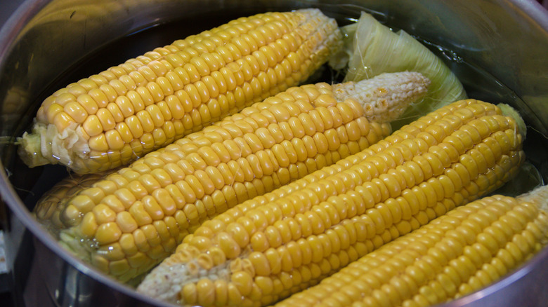 shucked corn in a pot