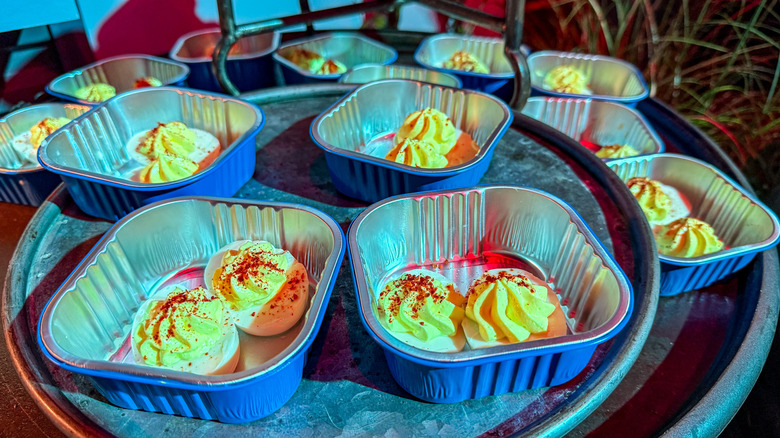 Deviled "eggs" in blue tin containers