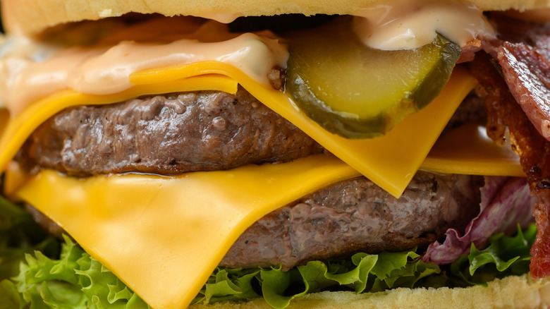 burger with slices of Kraft American cheese