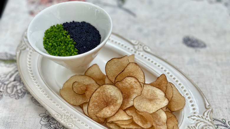 Caviar dip in bowl with chips
