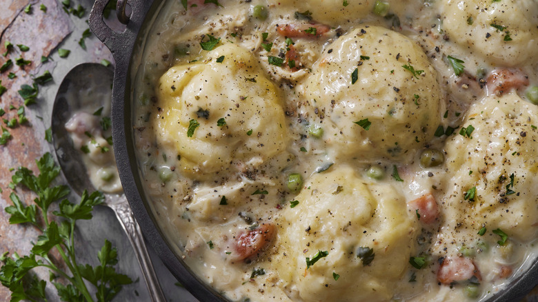 Up-close of skillet with chicken and dumplings