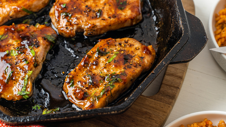 Glazed pork chops in a skillet