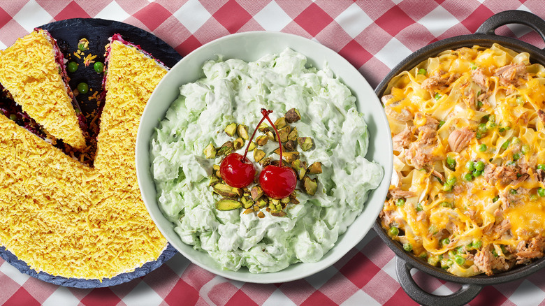 Three retro picnic dishes on a checker background