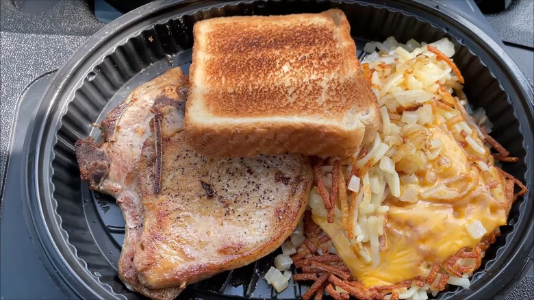 Pork chops with toast and hash browns at The Waffle House
