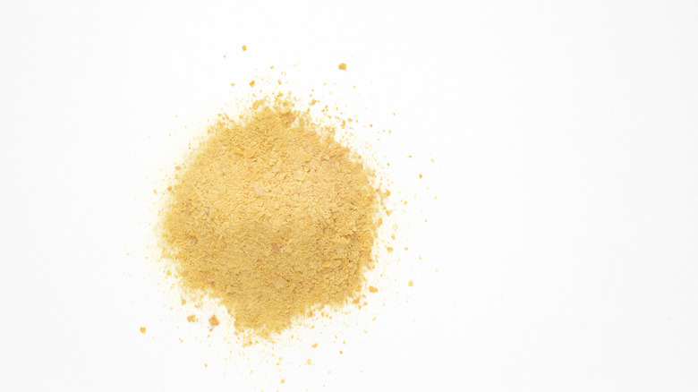 Nutritional yeast on white background