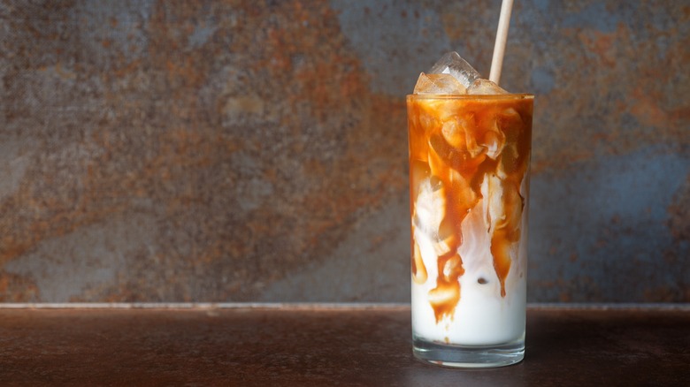 Coffee glass with caramel and milk