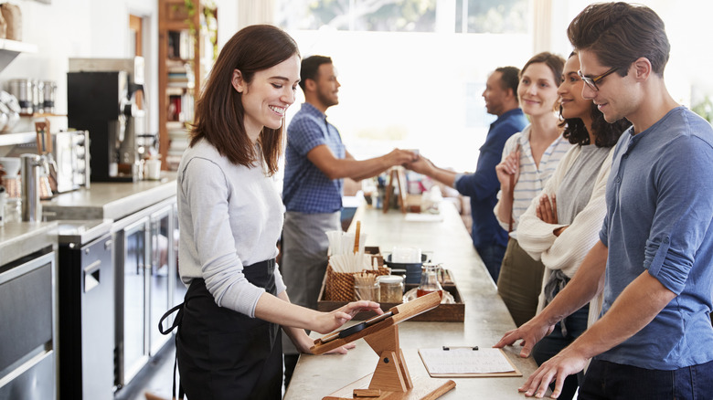 People placing an order at a coffee shop