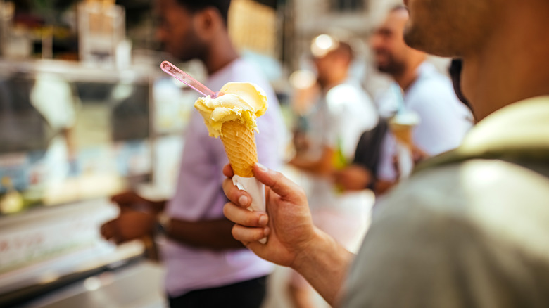 Cone of gelato in ice cream shop
