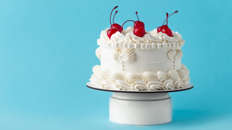 Blue background with white cake
