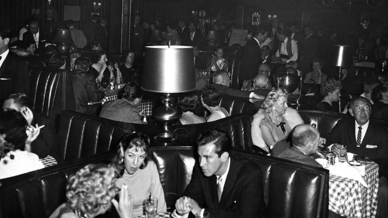 Interior of Chasen's Restaurant in 1960 showing people dining