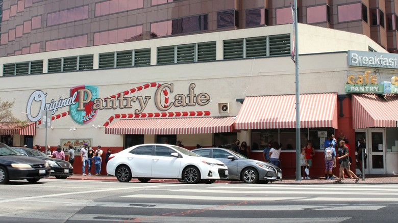 Original Pantry Cafe exterior with a line of people waiting to get in