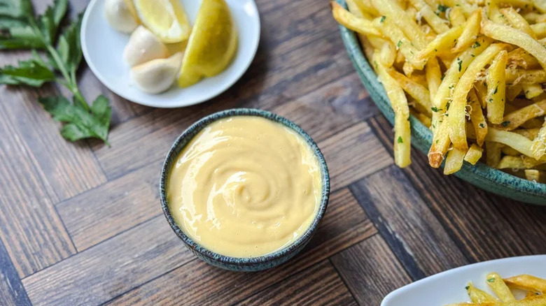 Double truffle aioli on wooden surface